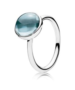 Silver ring with aqua blue crystal