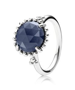 Silver ring with midnight blue crystal