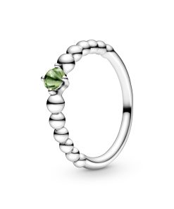 Sterling silver ring with treated spring green topaz