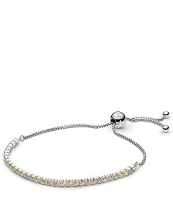 Rhodium plated silver bracelet with golden coloured cubic zirconia
