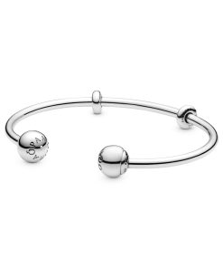 Silver open bangle with silicone stoppers and interchangeable end caps