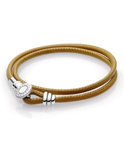 Silver leather bracelet. double. golden tan and clear cubic zirconia