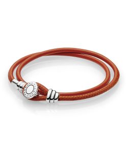 Silver leather bracelet. double.  spicy orange and clear cubic zirconia