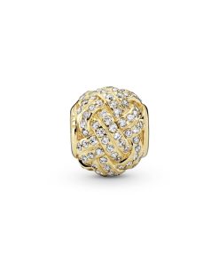 Love knot charm in 14k with clear cubic zirconia