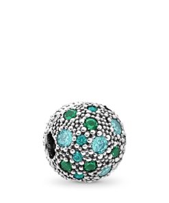 Silver clip with teal cubic zirconia. green crystal and bluish green crystal