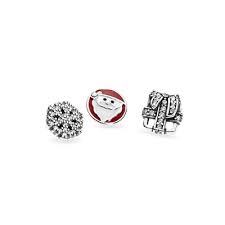 Petite elements pack in silver with Santa with mixed enamel colours. snowflake with clear CZ and silver gift with clear CZ