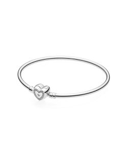 Silver bangle with heart-shaped clasp and clear cubic zirconia