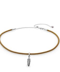 Feather pendant and choker with golden tan leather and pink cubic zirconia